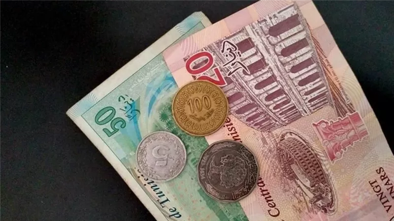 الدينار التونسي يسجل أعلى مستوياته مقابل الدولار منذ 2022