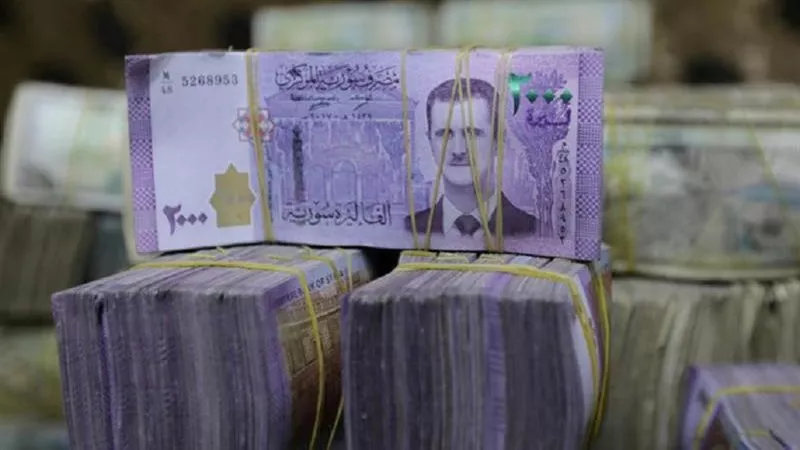 هبوط جديد لليرة السورية أمام الدولار الأمريكي